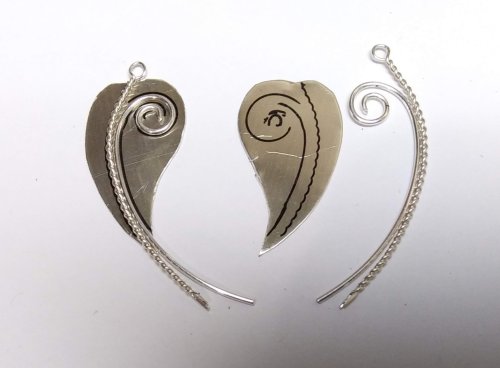 Judy Larson's Bali Style Earrings - , Contemporary Wire Jewelry, Stamping, Stamps, Butane Torch, Soldering, Solder, Drilling, Drill, Lay the twisted wire and scrolled elements on the leaf.